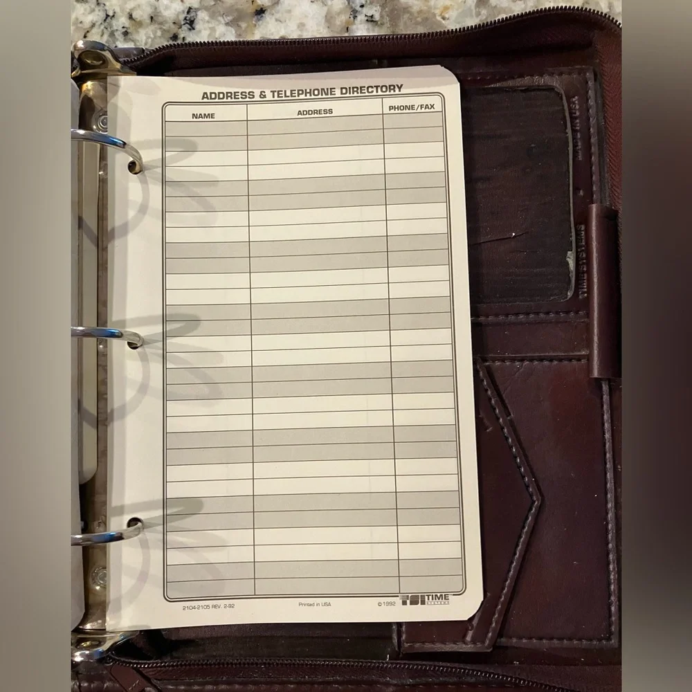 3-Ring Day-Timer planner binder with zipper closure
